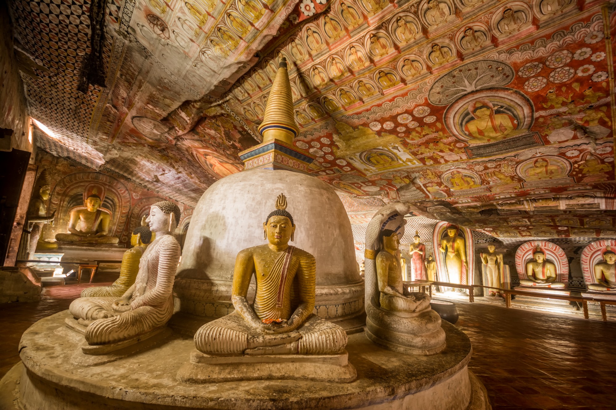 The Dambulla Ancient Cave Temple in Sri Lanka is a UNESCO World Heritage Site featuring centuries?old Buddha statues and vibrant mural paintings carved into natural rock caves, reflecting the country’s ancient Buddhist heritage.